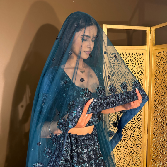 Teal All-over Embroidered Heavy Wedding-Reception Lehenga in Sequins with Big Latkans