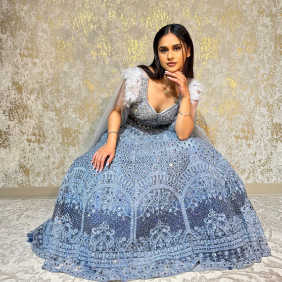 Formal Reception Lehenga Set with Feather Shoulders, Intricate Mirror Work on the Lehenga and Heavy Handwork on Blouse