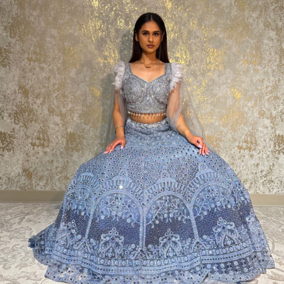 Formal Reception Lehenga Set with Feather Shoulders, Intricate Mirror Work on the Lehenga and Heavy Handwork on Blouse