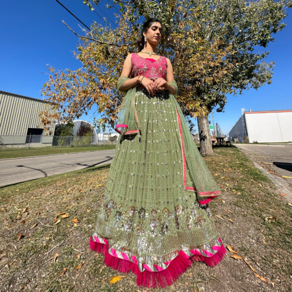 Hot-pink and Army Green Lehenga Set with Intricate Floral Handwork, Frill Design at the bottom and Tassels