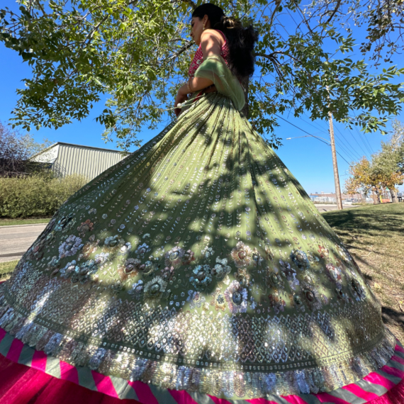 Hot-pink and Army Green Lehenga Set with Intricate Floral Handwork, Frill Design at the bottom and Tassels