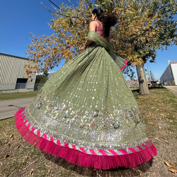 Hot-pink and Army Green Lehenga Set with Intricate Floral Handwork, Frill Design at the bottom and Tassels