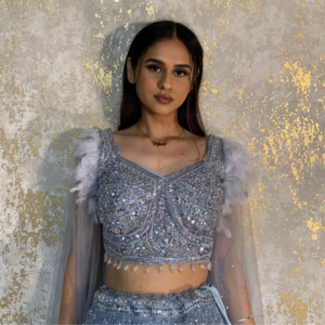 Formal Reception Lehenga Set with Feather Shoulders, Intricate Mirror Work on the Lehenga and Heavy Handwork on Blouse